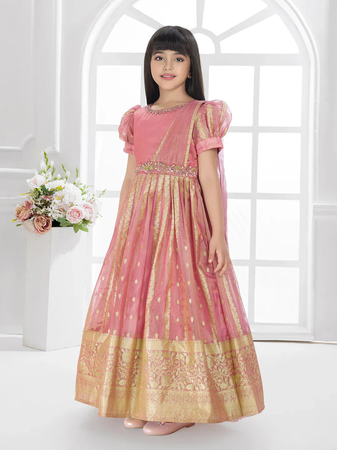 Carrot Ethnic Silk Flared Gown with Puff Sleeves – Festive Wear for Girls